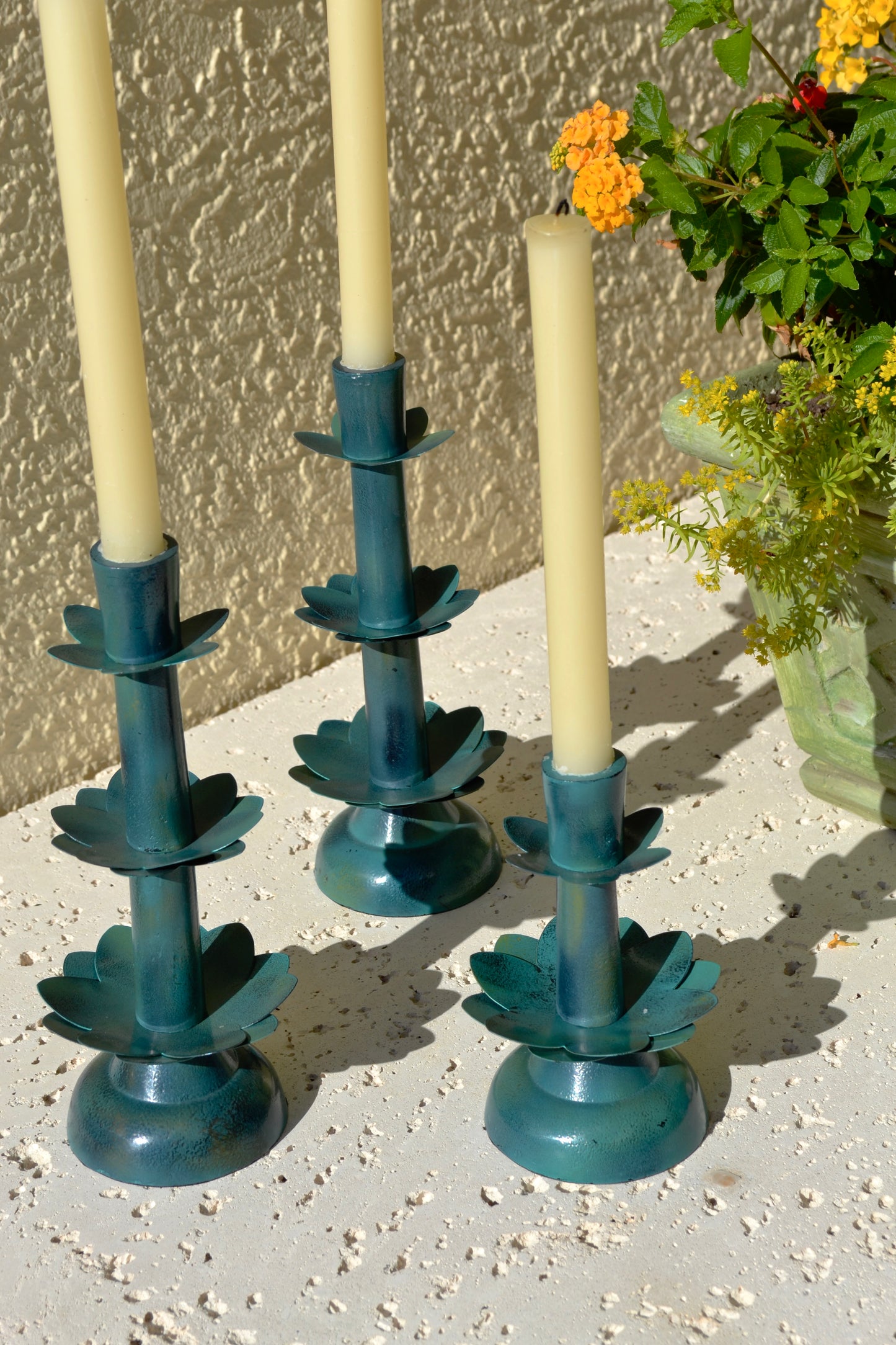 Metal candleholder, green candleholder, flower candleholder, coffee table decor, home accessories, teal decor, angled view