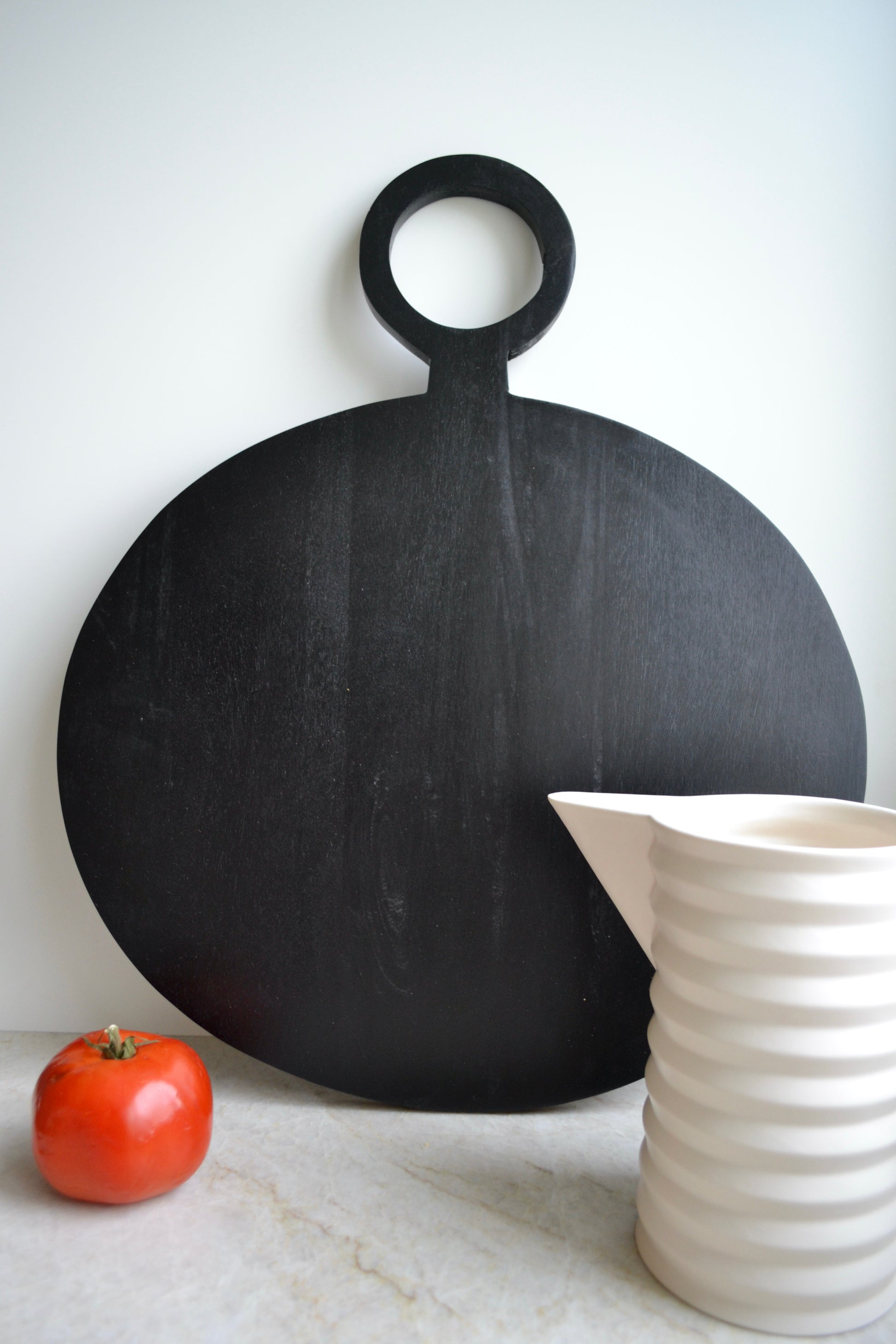 Charcuterie board, serving board, black cutting board, round black charcuterie board, black serving board, mango wood cutting board, home decor, full view