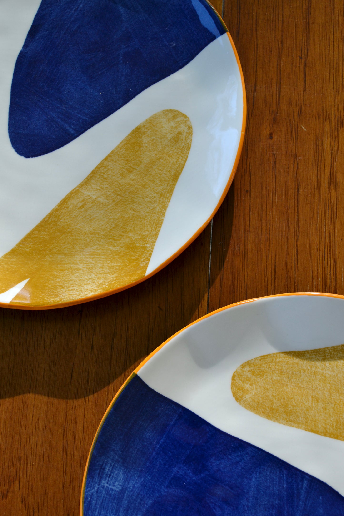 Porcelain plate set, orange blue yellow plates, six plate set, colorful plates, plate and bowl set, wavy edge plate, kitchen decor, partial view