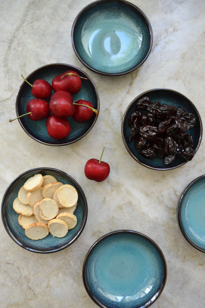 Pinch bowl, blue bowl set, small bowls, charcuterie bowls, artisan bowls, unique bowls, snack bowls, home decor, kitchenwares, eclectic kitchen, tiny bowls, overhead view.