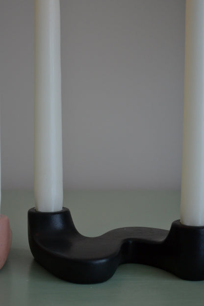 Wavy candle holder, concrete candle holder, brown candle holder, black candle holder, coffee table decor, eclectic decor, s shaped candle holder, unique candle holder, black candle holder view.