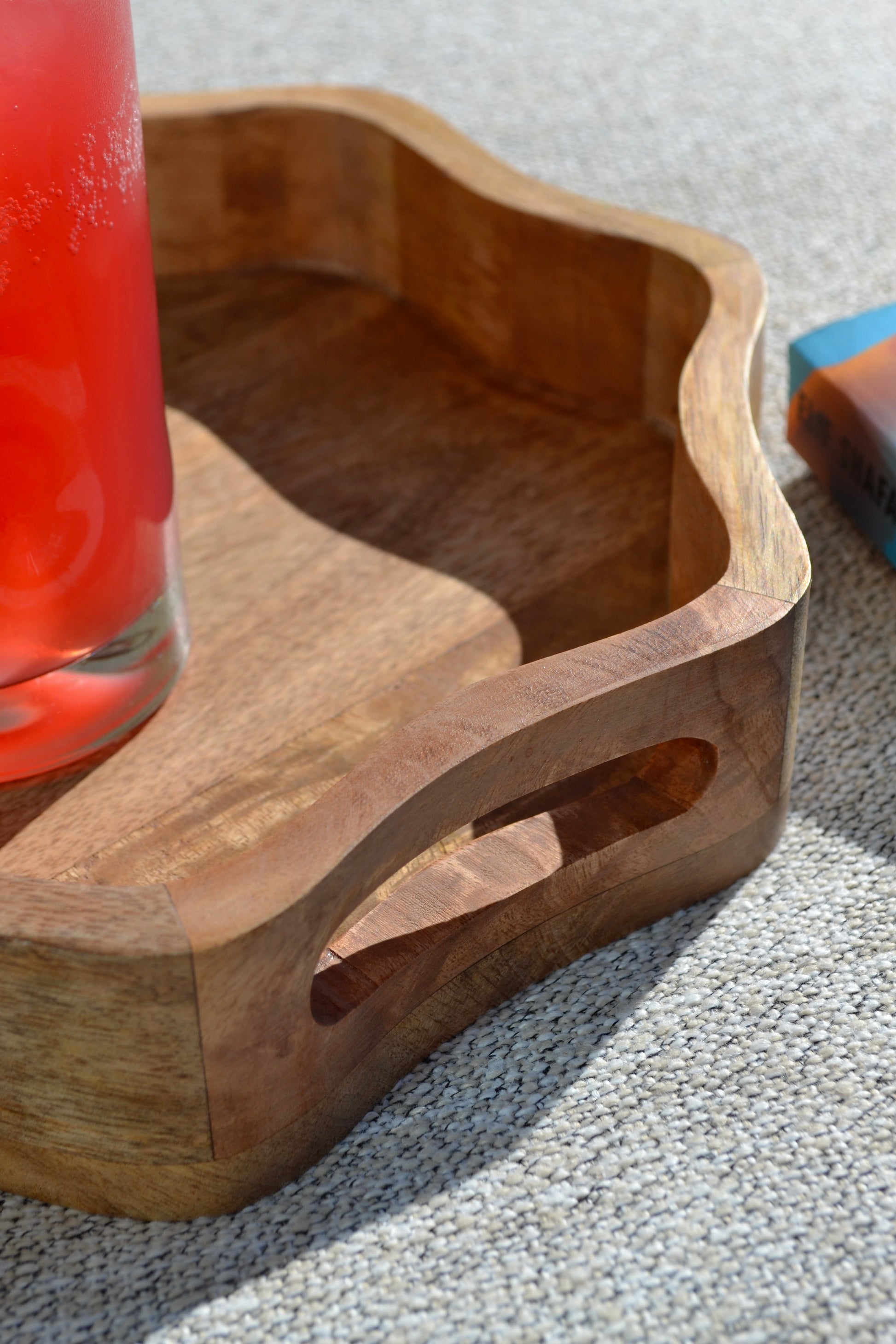 Wavy tray, scalloped wood tray, tray with handles, light wood tray, coffee table tray, home decor, living room accessories, angled view