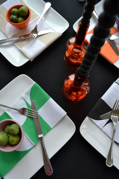 Colorful napkins, color block napkins, dining setting, kitchen home decor, multicolored napkin set, overhead angled view