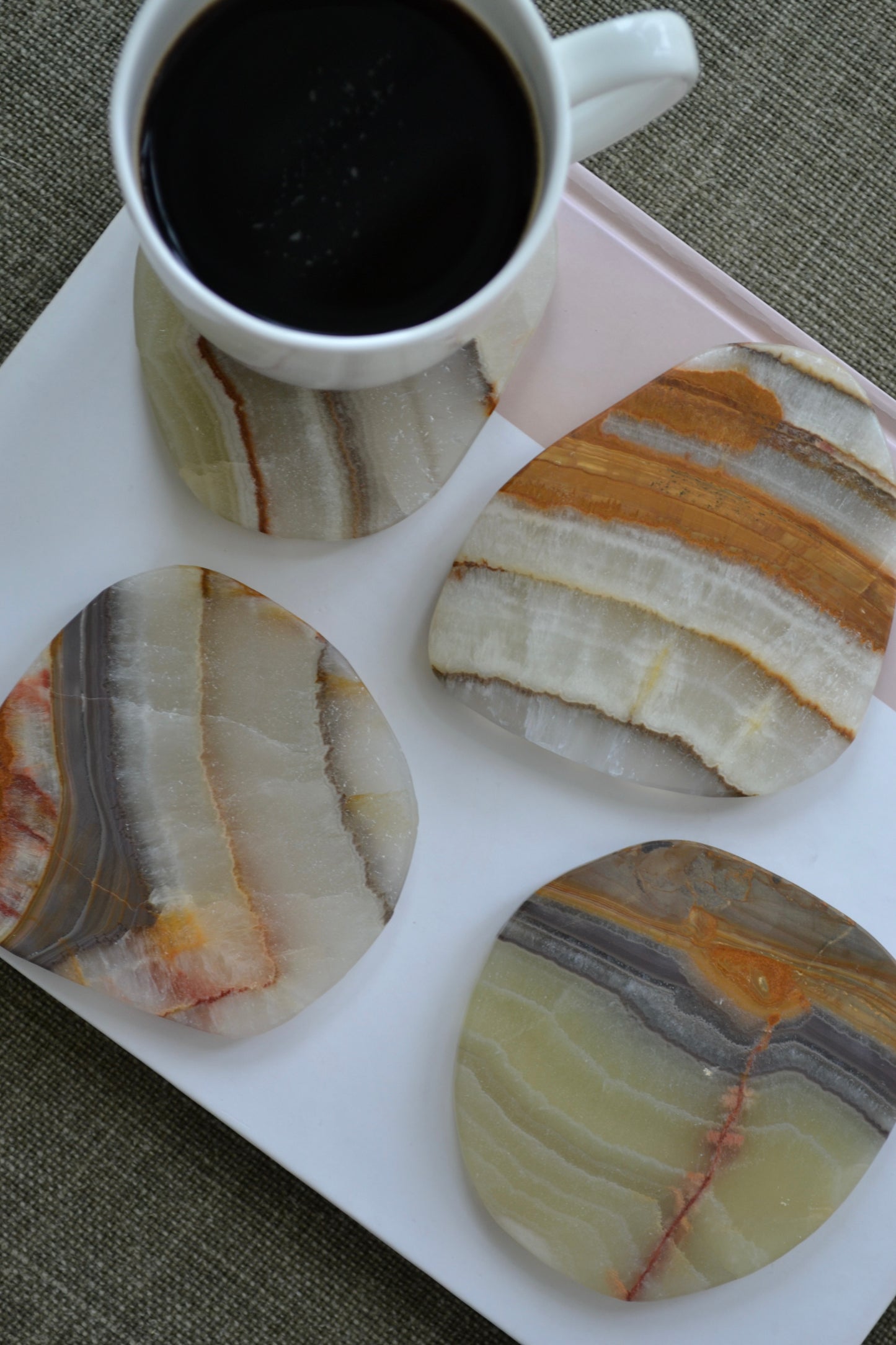 Onyx coaster set, set of coasters, funky coasters, stone coasters, green orange white coasters, natural decor, coffee table decor, home decor gift, wedding gift, house warming gift, overhead view.