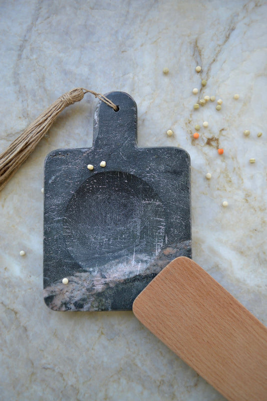 Stone spoon rest, black marble, jute tassel, marble kitchen home decor, overhead view